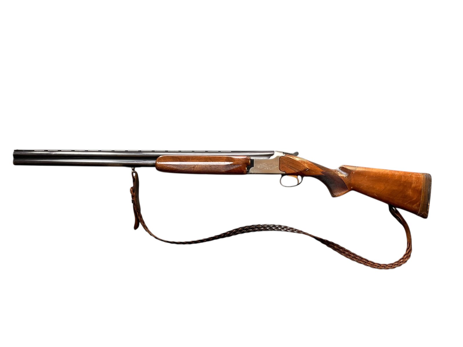 Strzelba bock Miroku w kalibrze 12/70 z pasem nośnym.