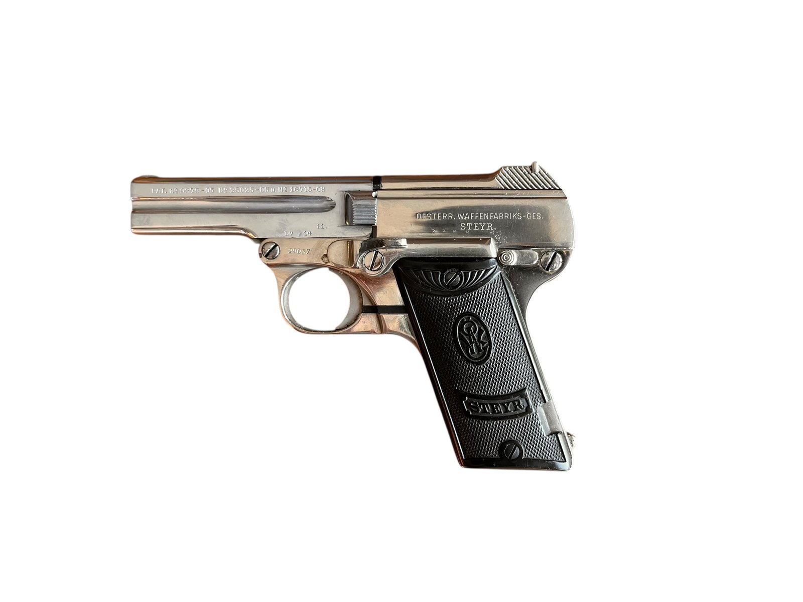 Kolekcjonerski pistolet Steyr 1908 z 1914 roku w kalibrze 7.65 Br., widok na unikalny mechanizm.