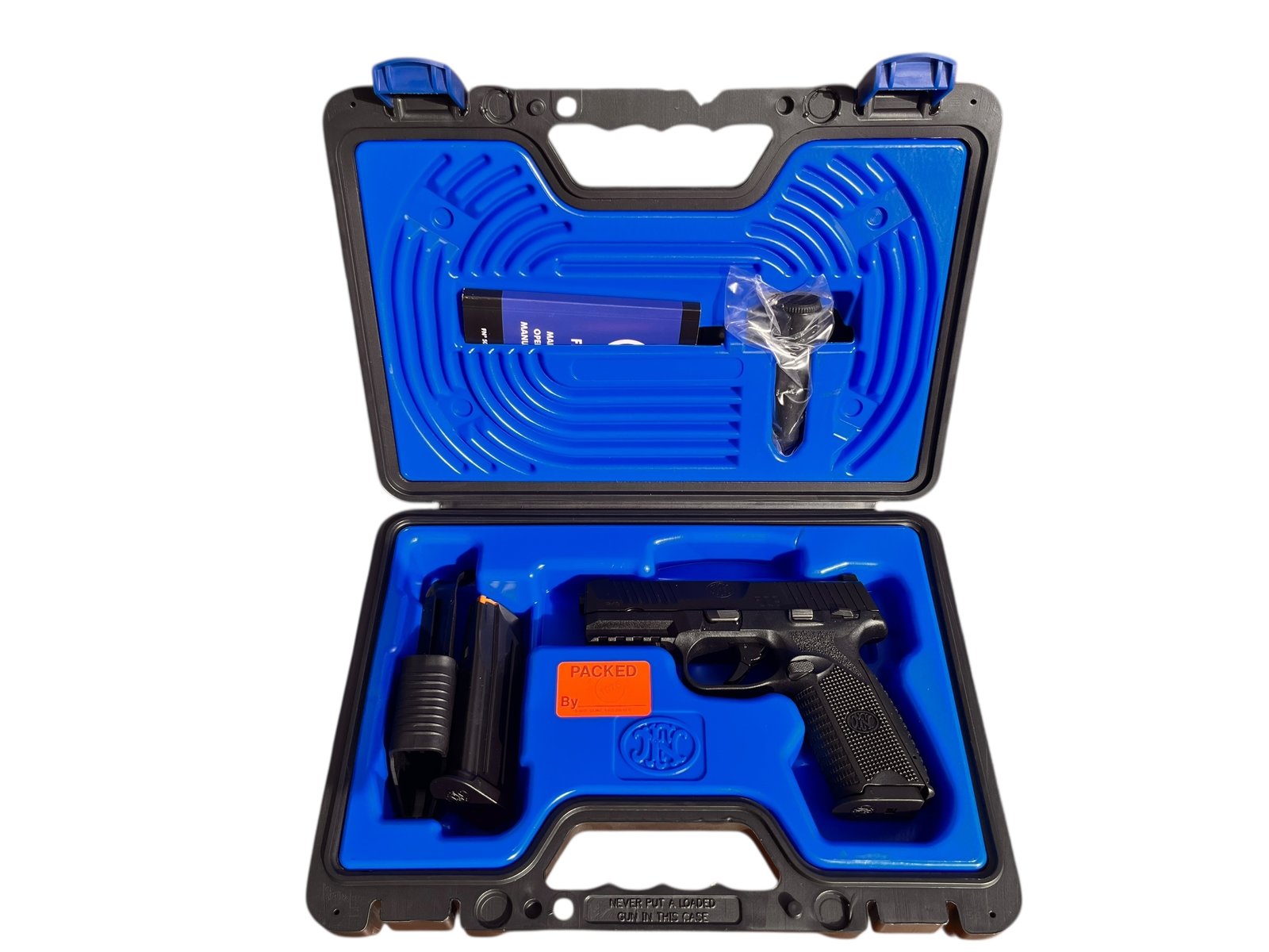 Nowy pistolet FN 509 MS w fabrycznym zestawie.