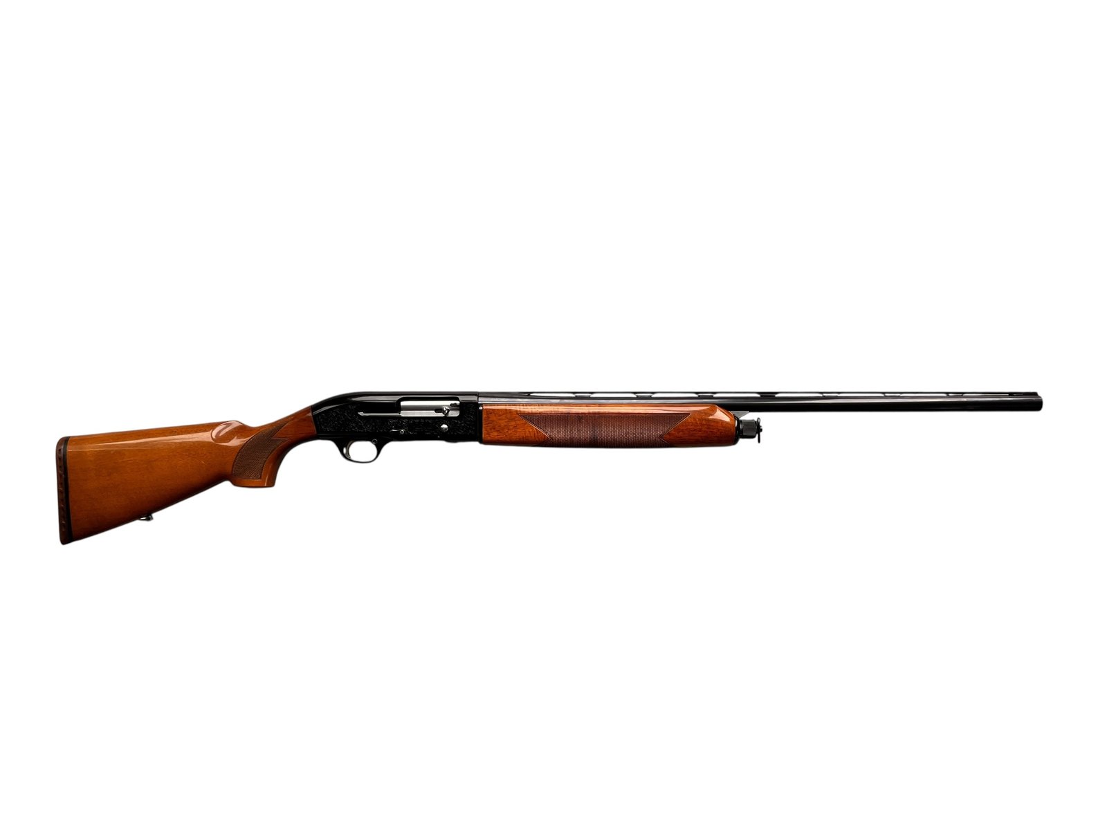 Klasyczna strzelba gładkolufowa samopowtarzalna Beretta A302 w kalibrze 12/70 z elegancką drewnianą osadą.